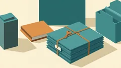 A bundle of teal folders tied with string and a key, beside an orange book: a complete company formation file